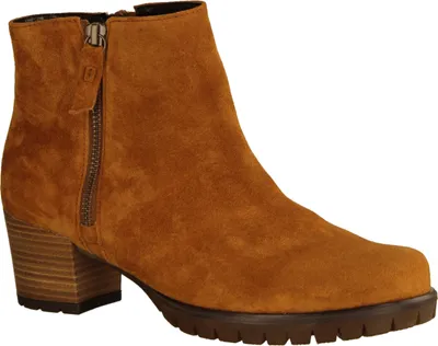 A single brown suede ankle boot with a zipper and a block heel is shown against a white background.