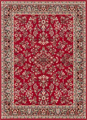 A top-down view of a red rug with a floral pattern.