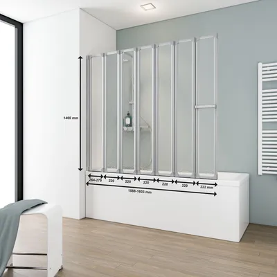 A shower screen is installed over a bathtub in a bathroom, with dimensions indicated.