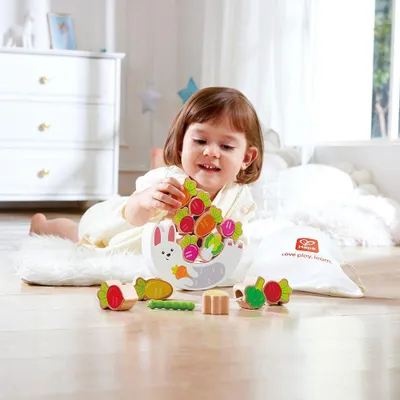 Obrázok produktu pre Hape Balancespiel Hra na balansovanie a navliekanie zajaikov Holzspielzeug