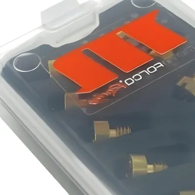 Close-up view of a product kit inside its clear plastic packaging.