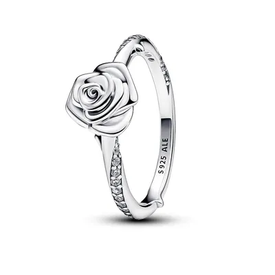 A silver ring with a rose design and small stones on the band, presented on a white background.