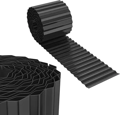 Two rolls of black corrugated metal edging are shown against a white background. One roll is mostly in focus in the foreground, and the other is in the midground, unrolling.