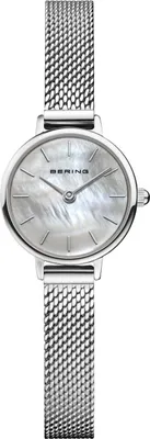 A product shot of a Bering women's watch with a silver mesh band and a mother-of-pearl dial.