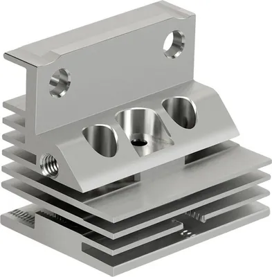 A close-up, isolated shot of a metal heatsink for a 3D printer.