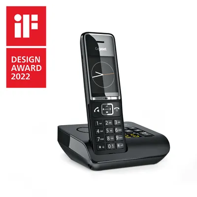 A Gigaset DECT cordless phone with answering machine is displayed on its charging base, with an award logo in the top left corner.