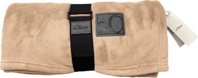 A rolled-up blanket with a strap and tags.