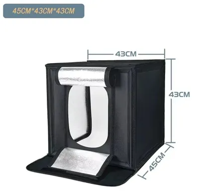 Produktbild von Fotostudio für Produktfotografie - Fotobox SH-SYP-03-40 - Maße 45 × 43 × 43 cm - 6 farbige Hintergründe - Tragbares Tischmodell - Nylongewebe