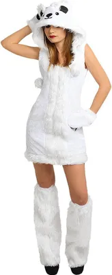 A woman is posing in a white polar bear costume.