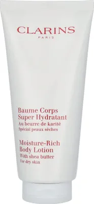 A white tube of Clarins body lotion is shown against a white background.