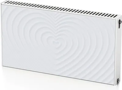 A white radiator cover with a heart-shaped embossed pattern, shown from a slight angle.