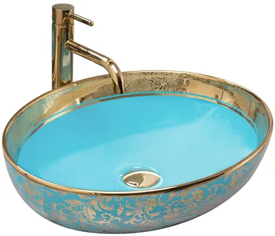 A close-up studio shot of a decorative vessel sink with a gold faucet.