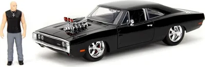 A black 1970 Dodge Charger R/T toy car with a figure of Dominic Toretto from Fast & Furious.