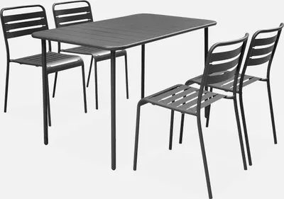 A table and four chairs set.