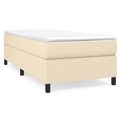 A studio shot of a box spring bed frame.