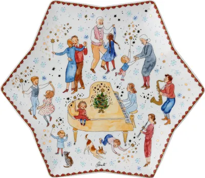 A star-shaped plate with a Christmas scene illustration.
