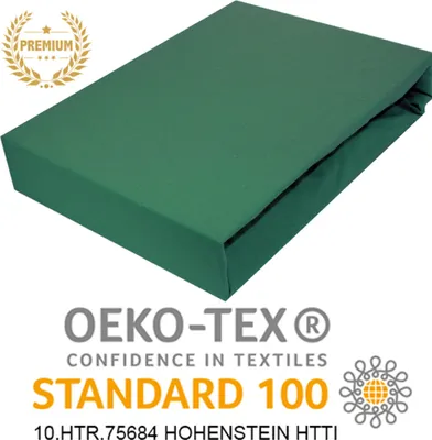 A green fitted sheet is shown on a white background with promotional text and logos.