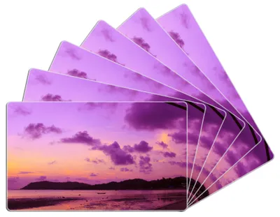 Produktbild von Wallario Frühstücksbrettchen 6er Set aus Glas, je 14 x 23 cm, mit rutschfesten Füßen, Motiv Sonnenuntergang unter Palmen  Himmel in lila und orange