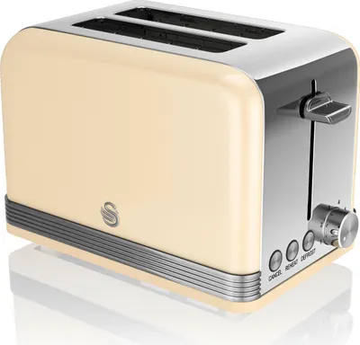 A cream-colored retro toaster with silver accents is shown from a three-quarter angle against a white background.
