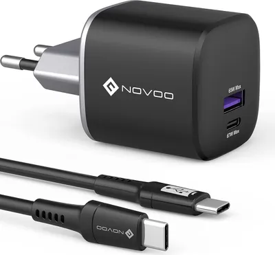 A black USB-C charger and cable set against a white background.