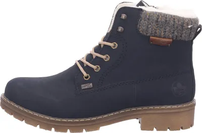 A side view of a navy blue women's boot with a tan sole and laces, and a gray knit cuff.