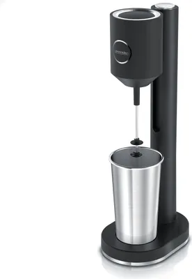 A black electric drink mixer with a silver cup placed on a white background.