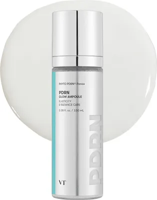 A product shot of a skincare ampoule bottle on a white and light gray background.