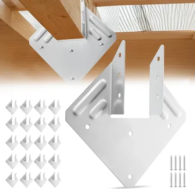 A collection of metal corner brackets and screws, with some brackets attached to wooden beams.