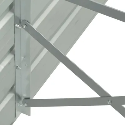 A close-up view of the metal support structure of a raised garden bed.