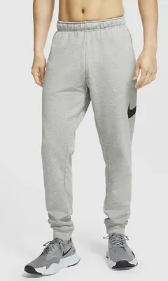 Zdjęcie produktu dla Nike - Spodnie treningowe Dri-FIT Tapered - Spodnie do biegania dla mężczyzn