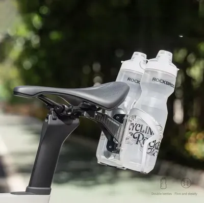 Produktbild von Rockbros Fahrrad Sattel Flaschenhalter Carbon Look Doppel Flaschenhalterung