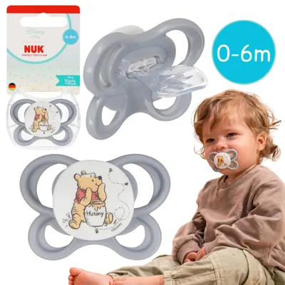 Produktbild von NUK DISNEY Winnie Puuh Air Beruhigungssauger, kiefergerecht, aus Silikon, für Neugeborene 0–6 Monate, mit Etui