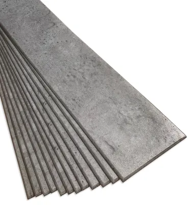 A stack of dark gray, concrete-effect decorative foam panels.