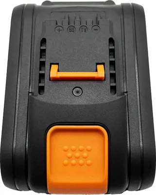 A close-up, straight-on view of a black and orange battery pack.