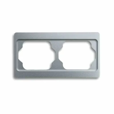 A close-up, studio shot of a gray electrical outlet frame with two openings.