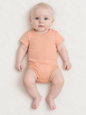 Produktbild von SITZTGUT Baby Body Pfirsich Größe 68–74 (6–9 Monate)