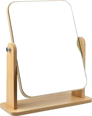A rectangular makeup mirror with a wooden stand.