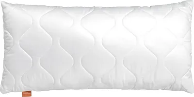 A white quilted pillow is shown from the front against a white background.