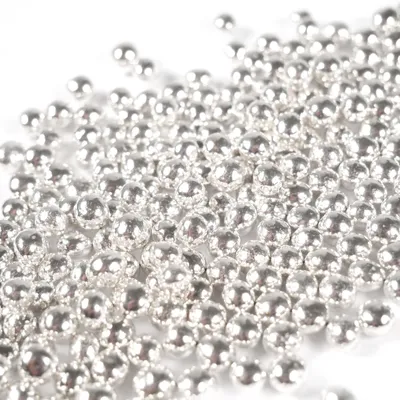 Produktbild von Streuselheld Crispy Schokokugeln Silber Metallic 6mm 80g Schokoladenstreusel für herbstliche Kuchen, Desserts & Gebäck