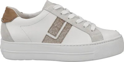 A side view of a white sneaker with gold glitter accents and tan suede detailing.