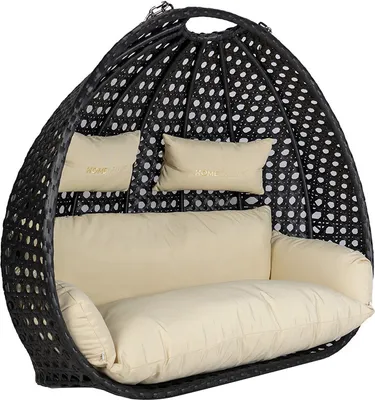 A black polyrattan hanging chair with beige cushions.