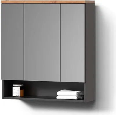 A modern bathroom cabinet with a wooden top and gray doors, featuring an open shelf with a jar and folded towels.