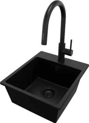A black granite kitchen sink with a black faucet against a white background.