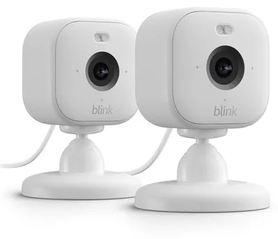 Productafbeelding van Amazon Blink Mini 2, Beveiligings-IP-camera, geschikt voor binnen en buiten, draadloos, compatibel met Amazon Alexa, kan op een tafel of aan de muur worden geplaatst, wit