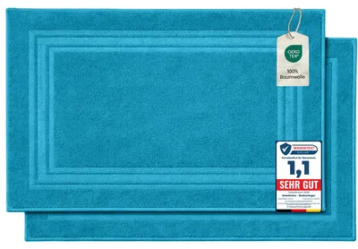 Zdjęcie produktu dla Dwa dywaniki łazienkowe Komfortec wykonane w 100% z bawełny, o gramaturze 600 GSM, idealne pod prysznic