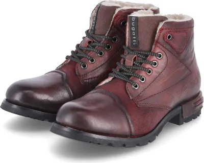 A pair of burgundy leather winter boots with laces and faux fur lining, presented on a white background.