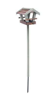 A wooden birdhouse on a pole, isolated on a white background.