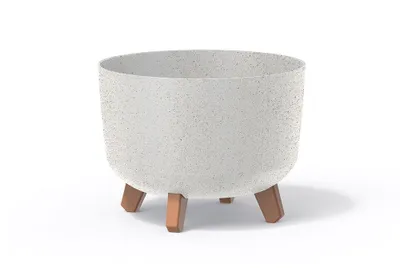 A white speckled planter pot with three brown wooden legs, isolated on a white background.