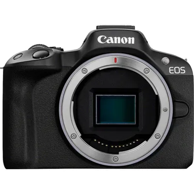 A front view of a black Canon EOS R50 mirrorless camera with the lens mount exposed.