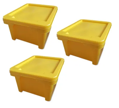 Three yellow storage boxes with lids are arranged diagonally on a white background.